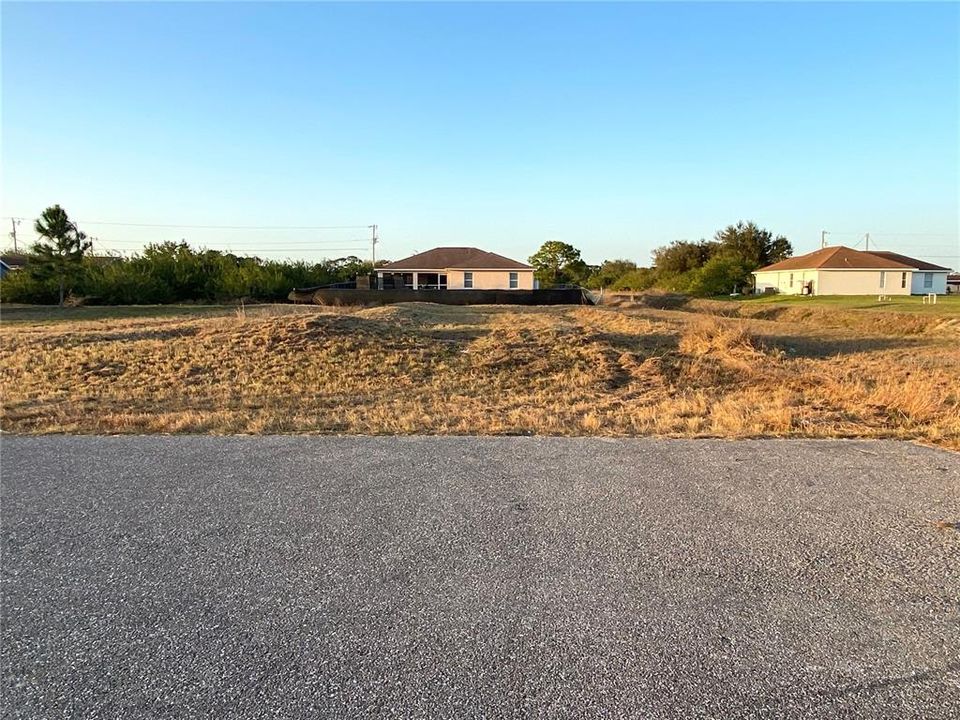 Direct View - of OTHER SIDE of STREET, - Across from the Lot.