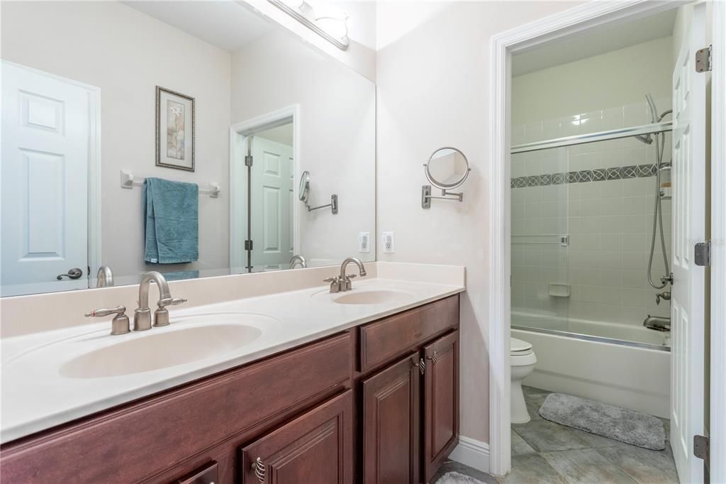 Secondary Bathroom features Double Sinks