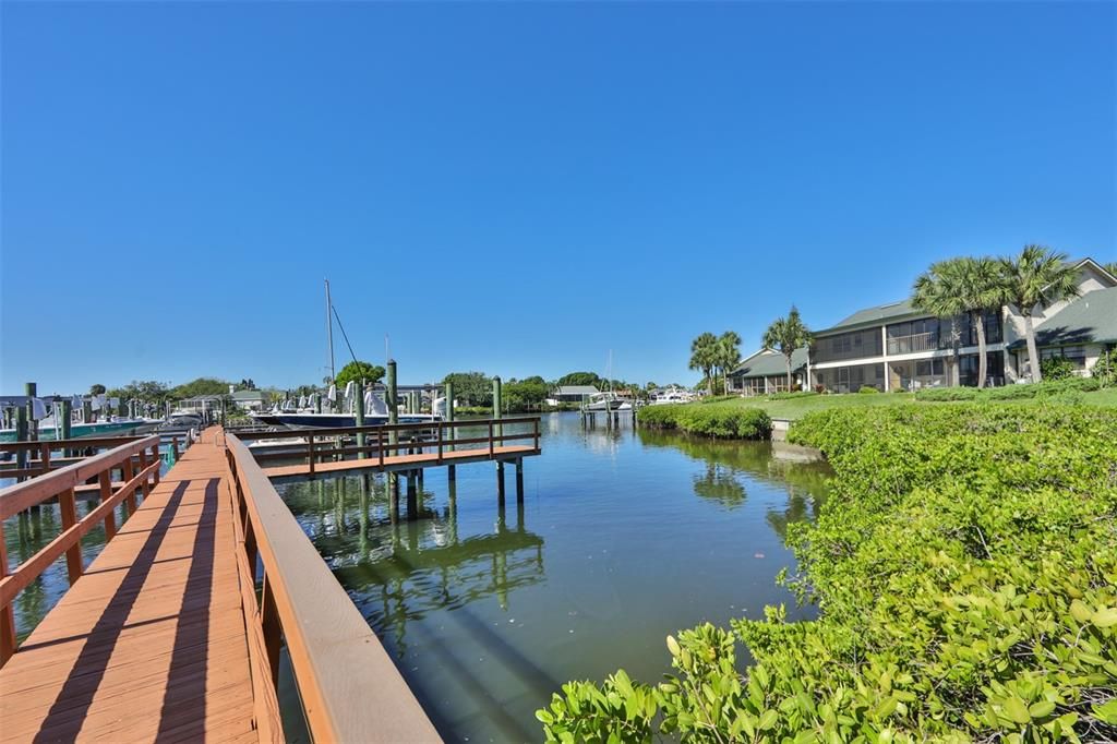 Breathe deeply as you overlook the water strolling up and down the more recently renovated private community composite dock.