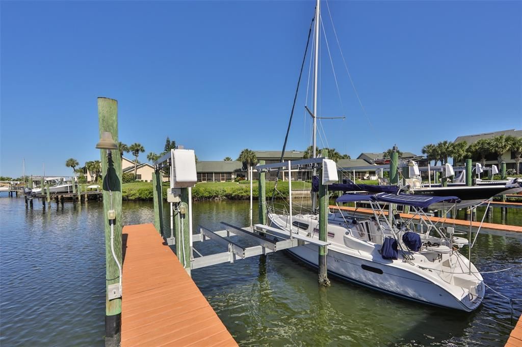 Deeded assigned boat slip #11, has electric, water and security lights are located along the dock.