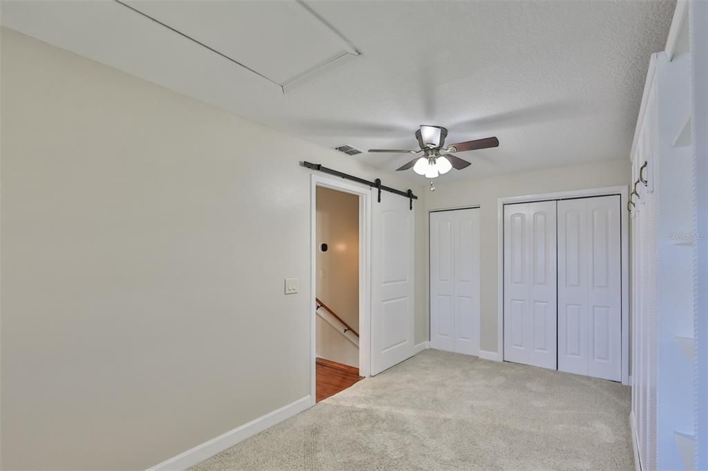 Freshly painted, high end carpeting with waterproof barrier and premium padding so that no sounds carry downstairs is a real bonus in this room!