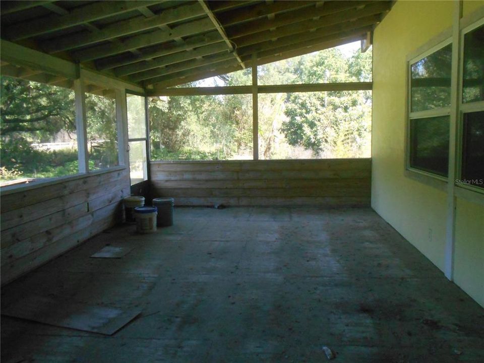 FRONT SCREENED PORCH/DOOR FROM PORCH/LAUNDRY ROOMROOM