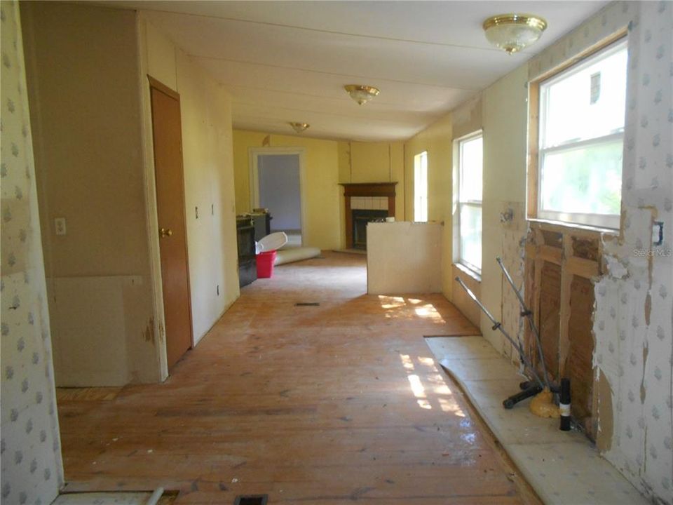 View of Kitchen Area from Dining area to Den!