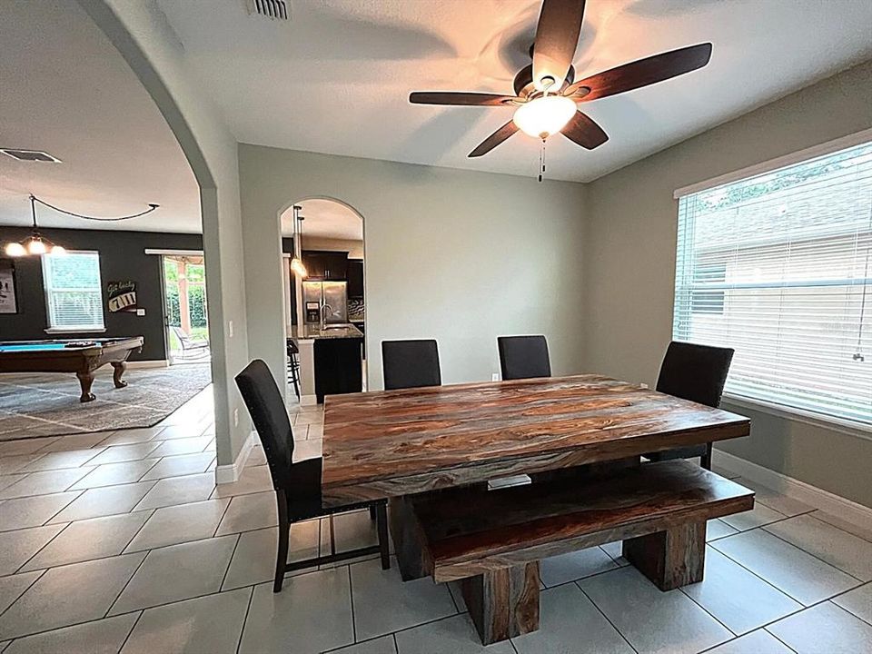 Formal Dining room with arches