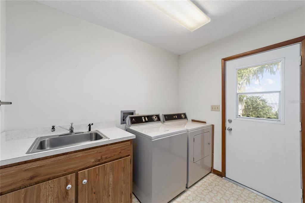 Utility room with access to the backyard