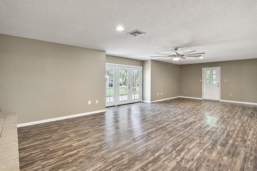 Living Room with French Doors to Backyard