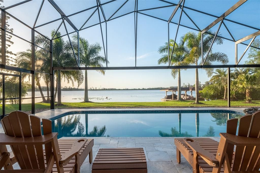 Screen Enclosed Pool and Unobstructed View of Lake