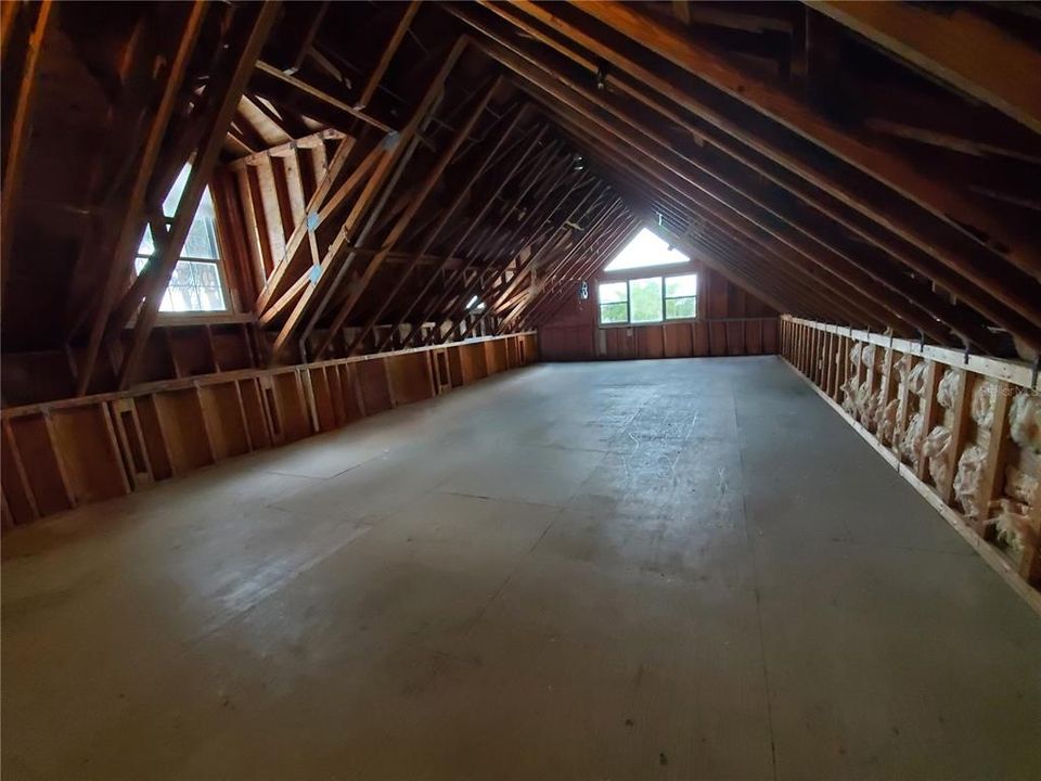 Unfinished Attic Space Facing Towards the Rear of the Home