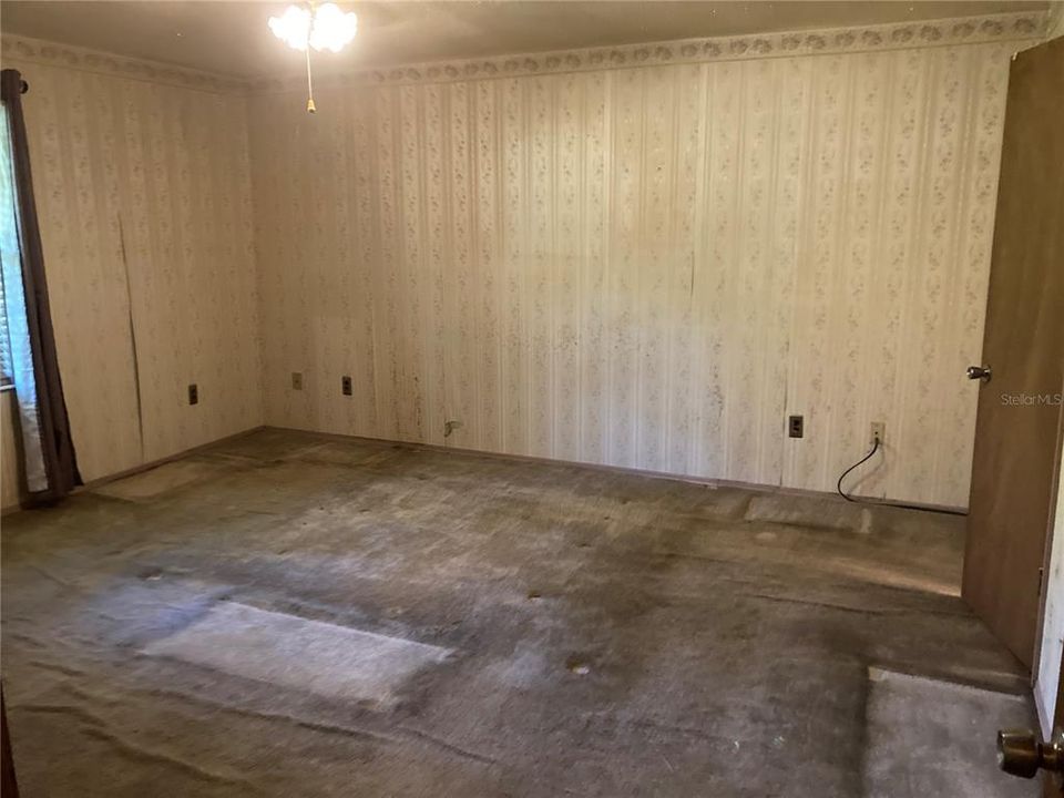 Master bedroom carpet in poor condition.