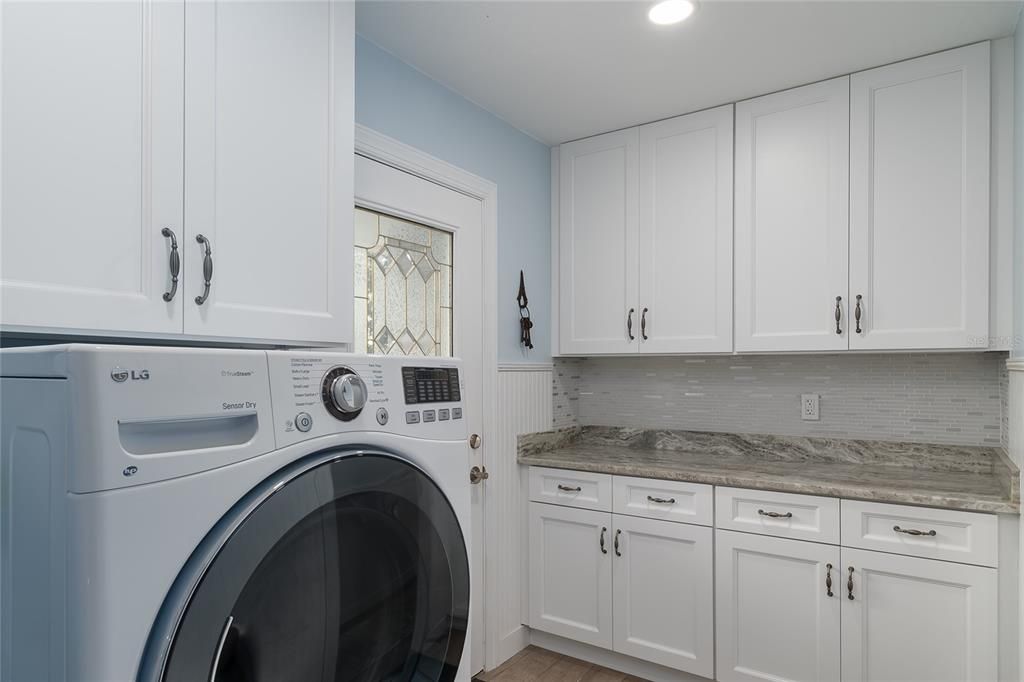 Laundry center with lots & lots of storage, 42" cabinets