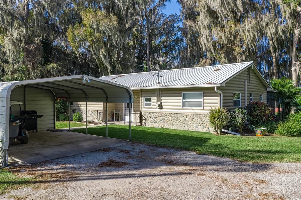 driveway view with carport