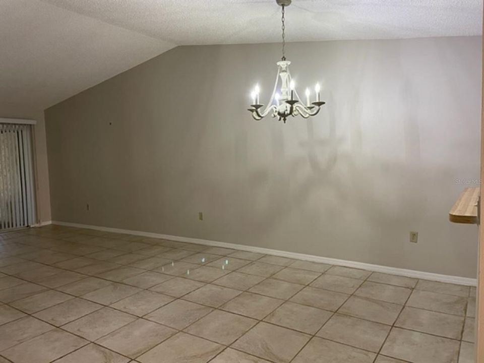 Dining Room with Vaulted Ceiling