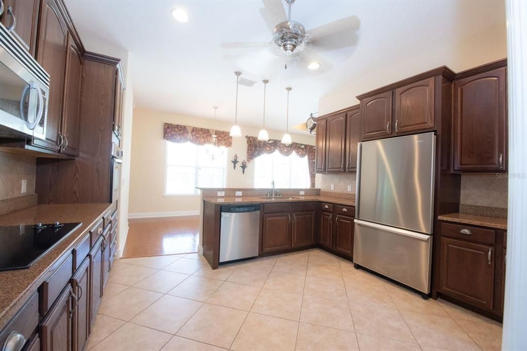 All appliances are included in this huge kitchen. Formal dining room entry (not shown)