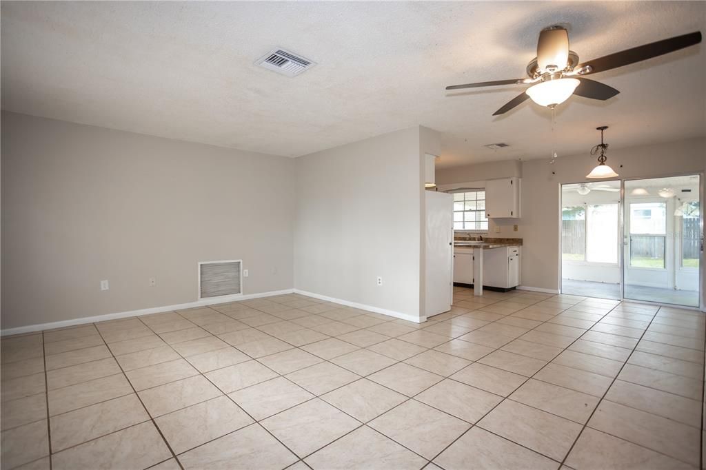 Dining area leads to rear patio