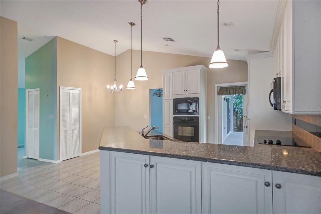 Ceramic tile in kitchen, foyer, front hallway, laundry and both bathrooms.