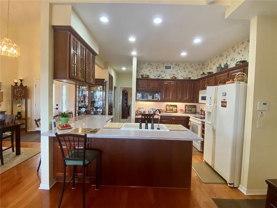 View of kitchen from hallway to RV garage