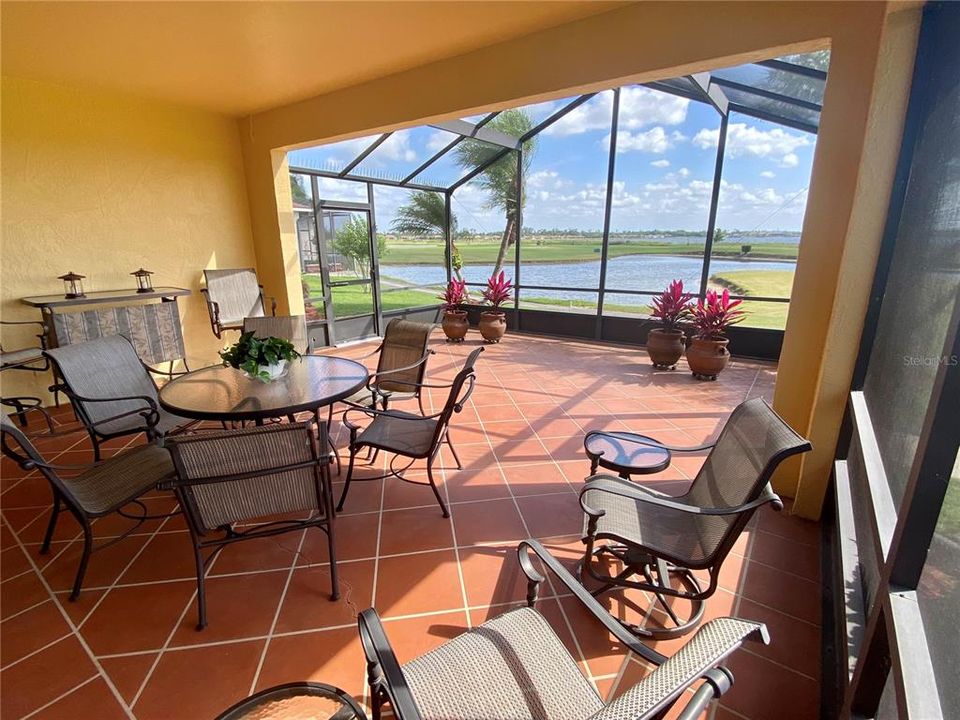 veranda showing fabulous view of golf course and water
