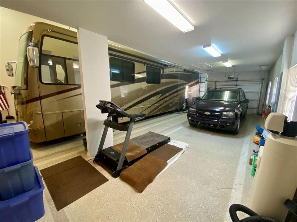 RV garage with oversized tandem car garage