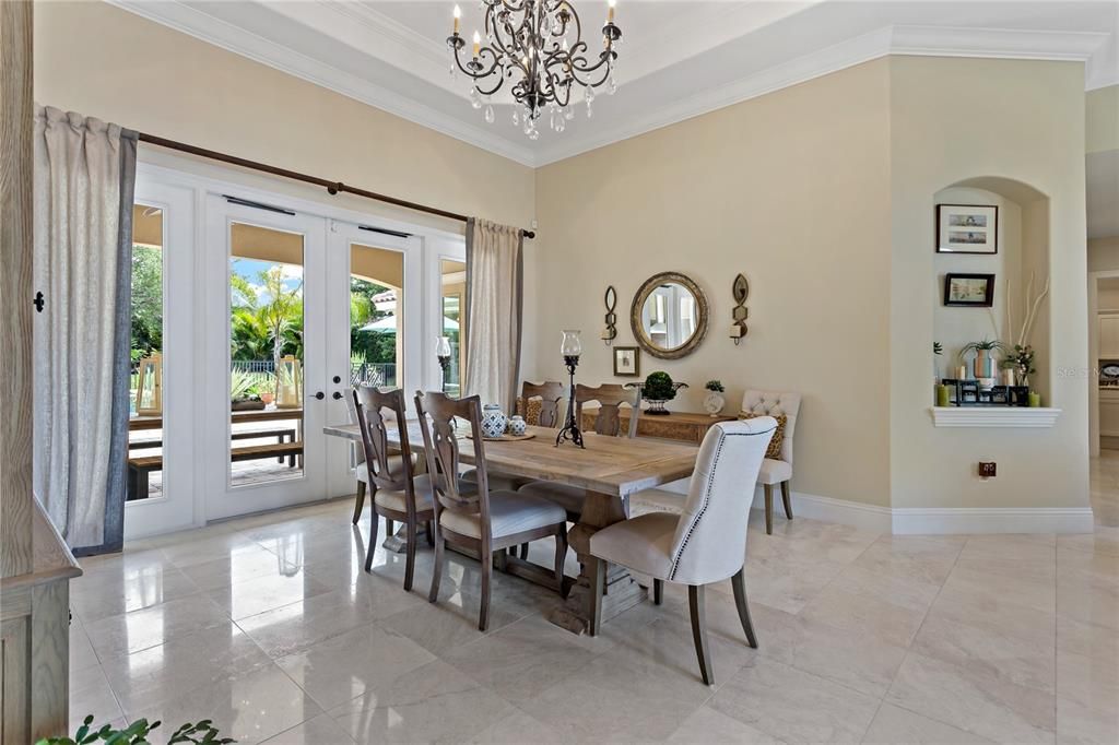 FORMAL DINING ROOM WITH ELEGANT TRAY CEILINGS & CROWN MOLDING!