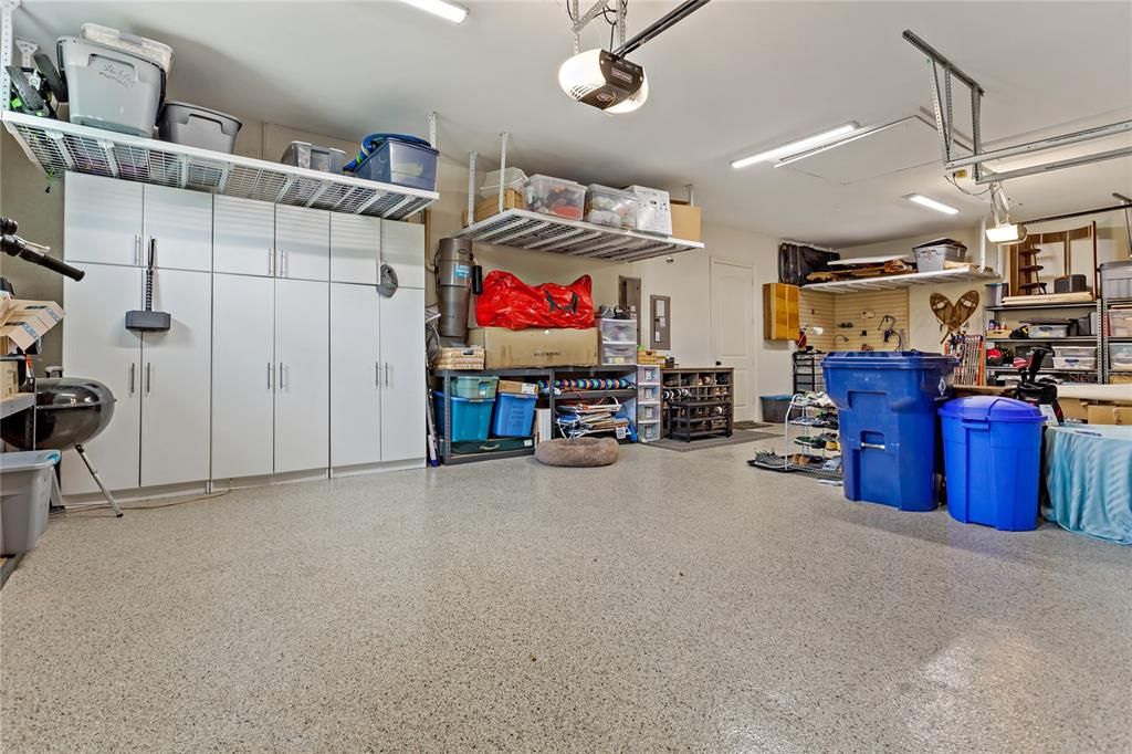 CUSTOM MATCHED EPOXY FLAKED FLOORING AND WALL PAINT AND SO MUCH STORAGE!
