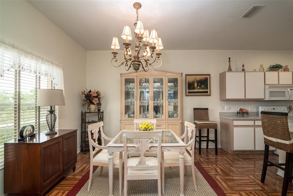 The dining room gets great natural light from the large window area that looks out to the backyard.