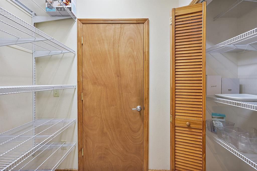 Pantry is located between the kitchen and garage!