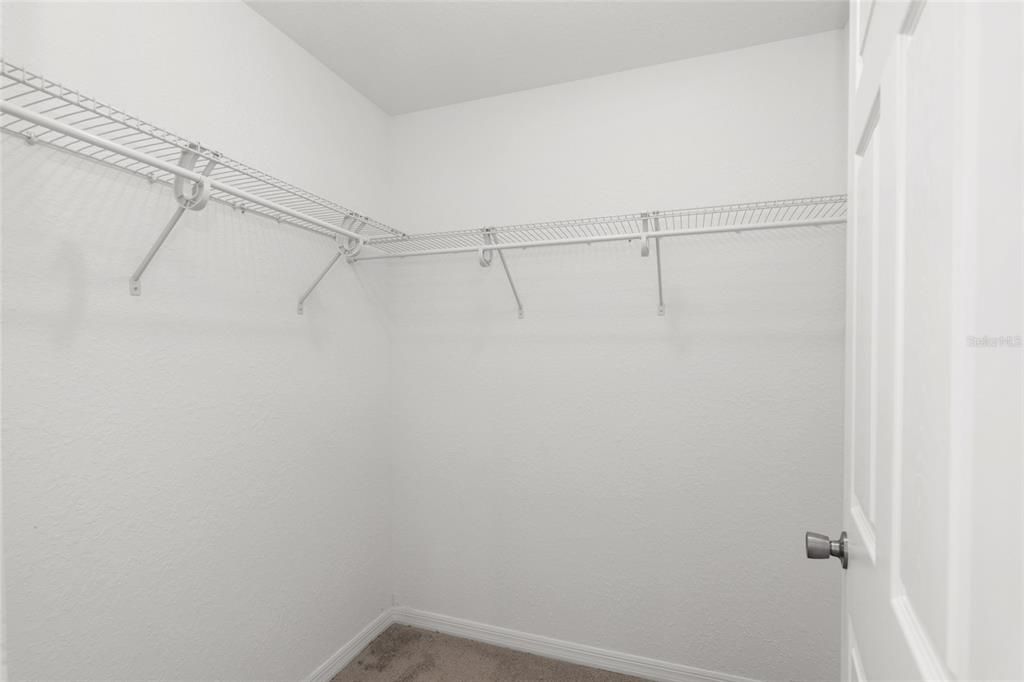 Walk in closet in Primary Bedroom