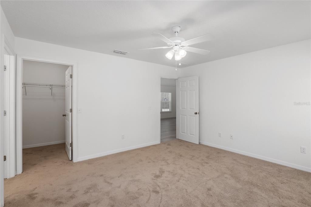 Primary Bedroom with carpet