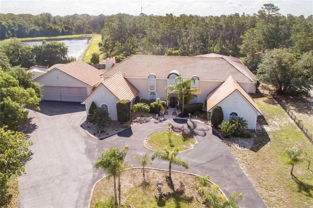 Circular Driveway and easy access to the 35x47 Airplane Hangar.