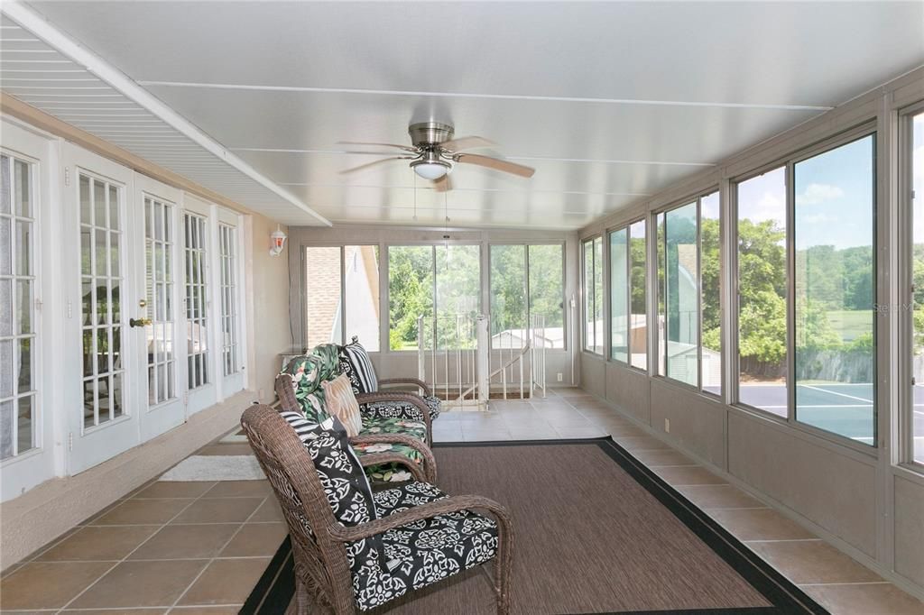 Enclosed Balcony off of Master Bedroom . Has view of the Pond behind this property