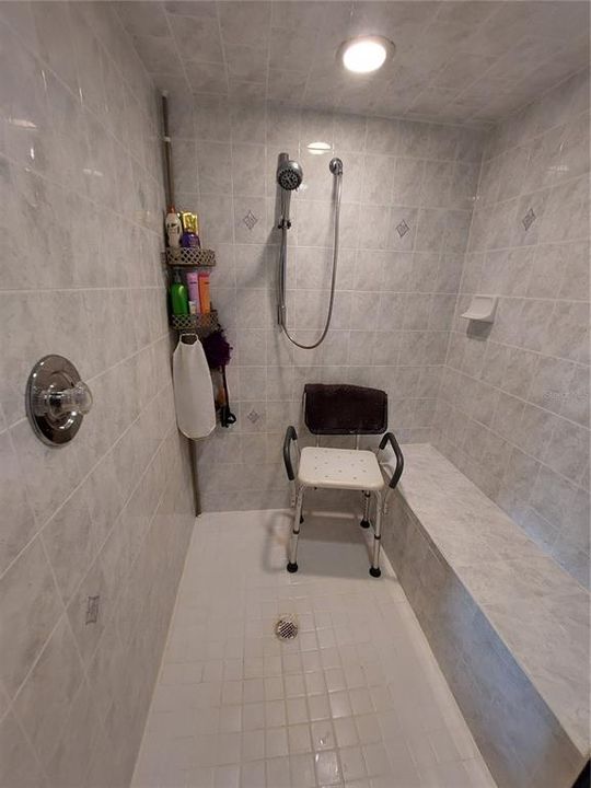 Updated Tile Shower with Built in Bench in Master Bath