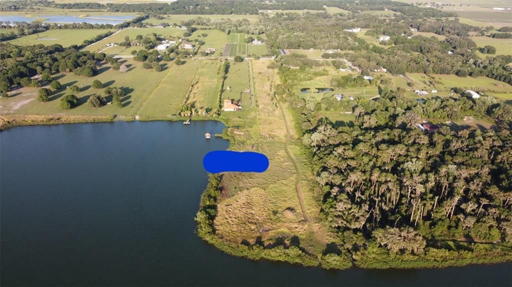 Easement marked on blue. Access to the lake.