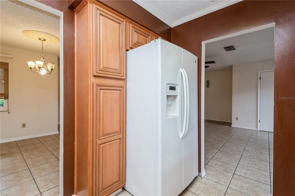 side-by-side refrigerator - pantry cabinet