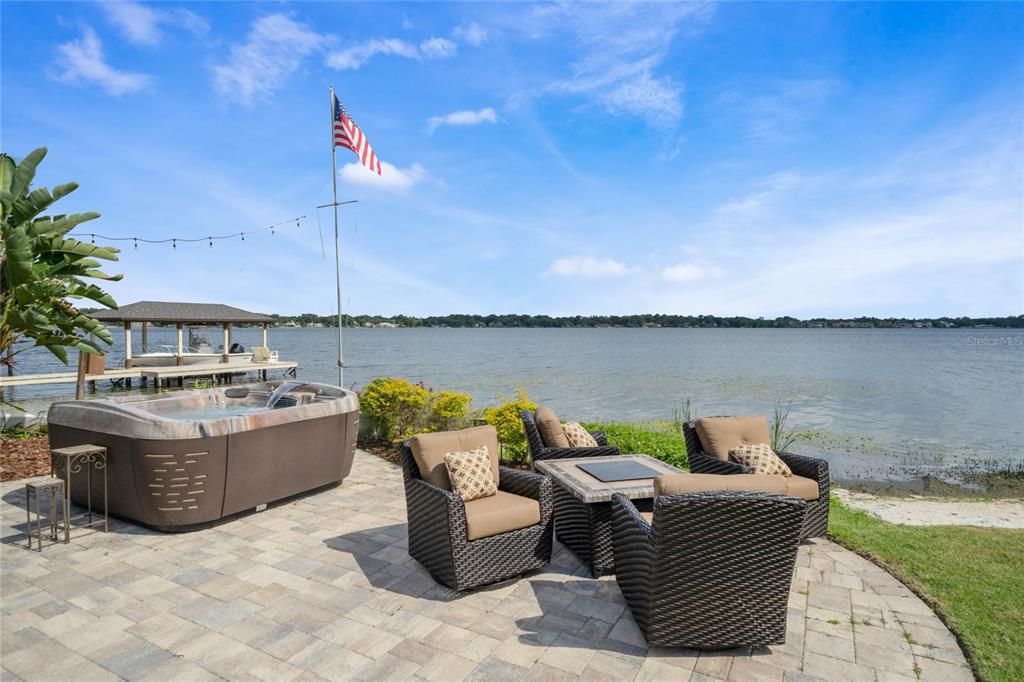 Private fire pit area with opulent hot tub