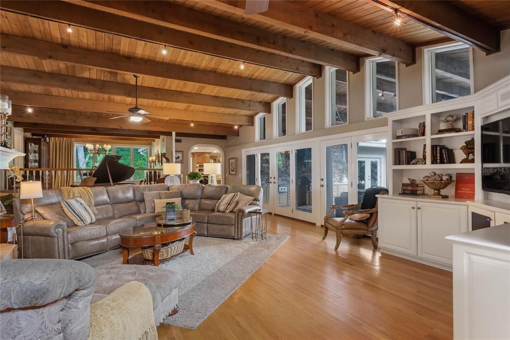 Spacious family space with vaulted ceiling and French doors