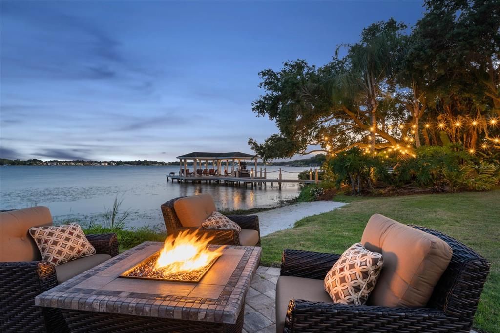 Private fire pit area with opulent hot tub