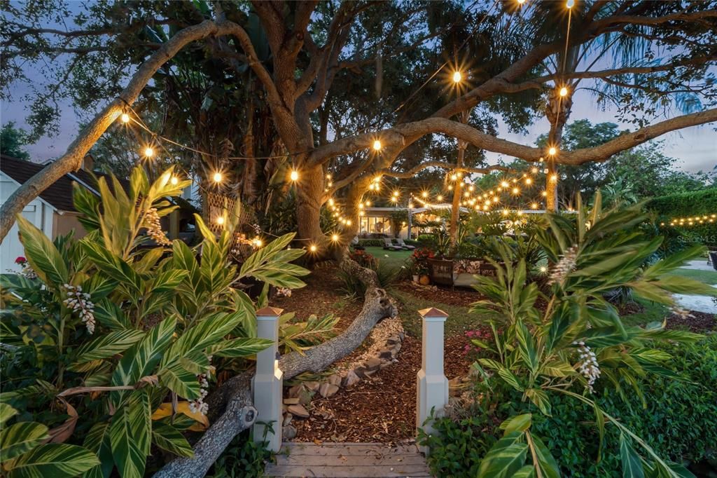 Private lakefront gardens with twinkly lights