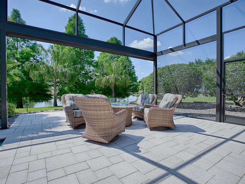 ROLL UP SCREEN BY FIRE PIT TO ALLOW FOR NON-OBSTRUCTIVE VIEW!  THE FIRE PIT HAS PIPED IN NATURAL GAS!