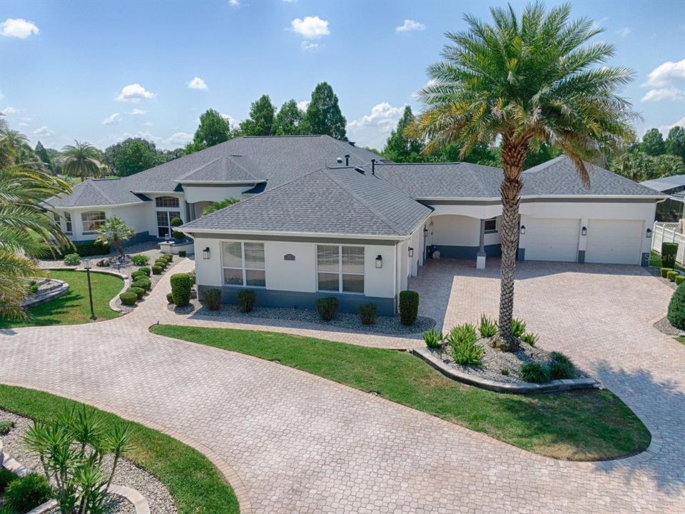 AERIAL VIEW OF THE GARAGES! EXPANDED 2 CAR WITH TANDEM GOLF CART ON THE LEFT AND THE 2 CAR WITH CAR LIFT ON THE RIGHT!