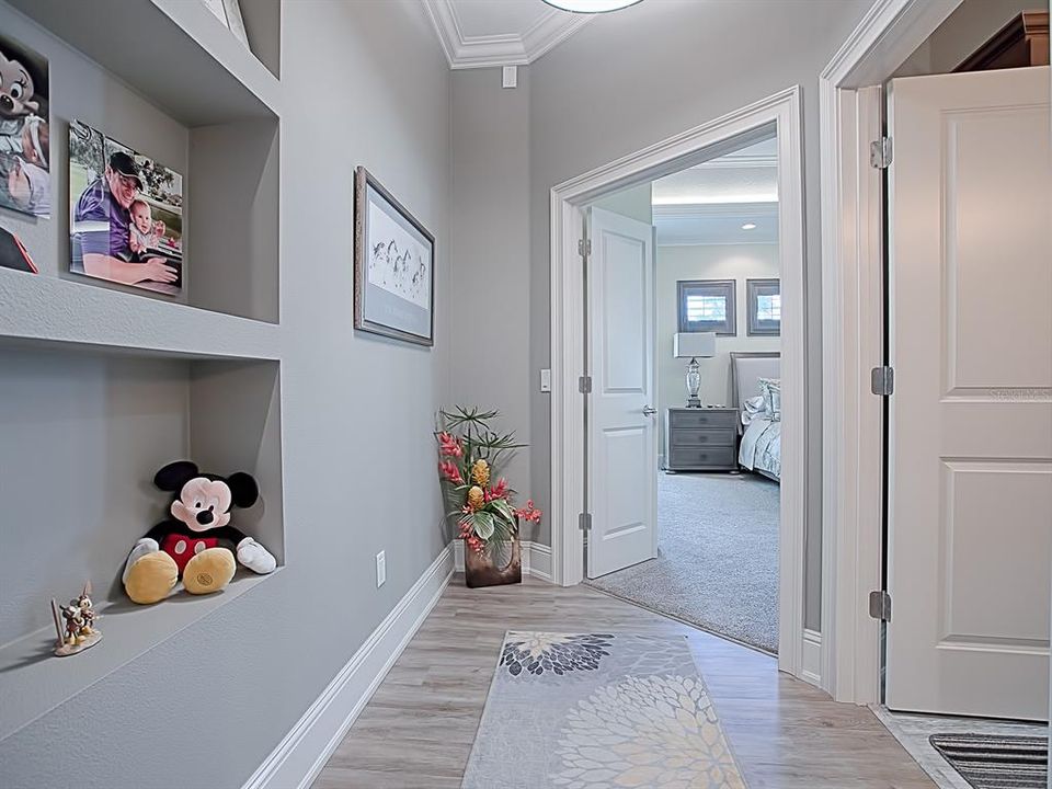 HALLWAY TO MASTER BEDROOM!  THE POOL BATH IS ON YOUR RIGHT!