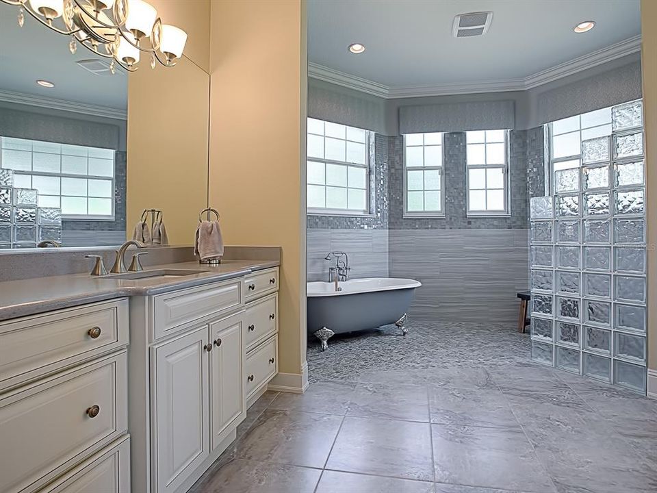 LOVELY MASTER BATH COMPLETELY REMODELED!  CLAW FOOT TUB AND WALK-IN SHOWER!