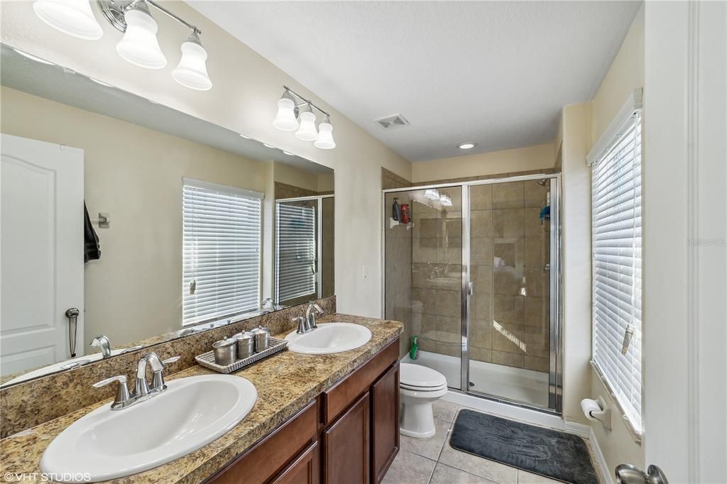 Master en-suite with dual sinks and large shower