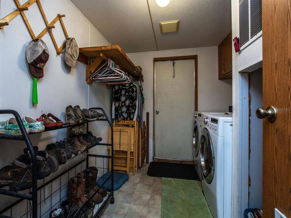 Indoor laundry room with storare space