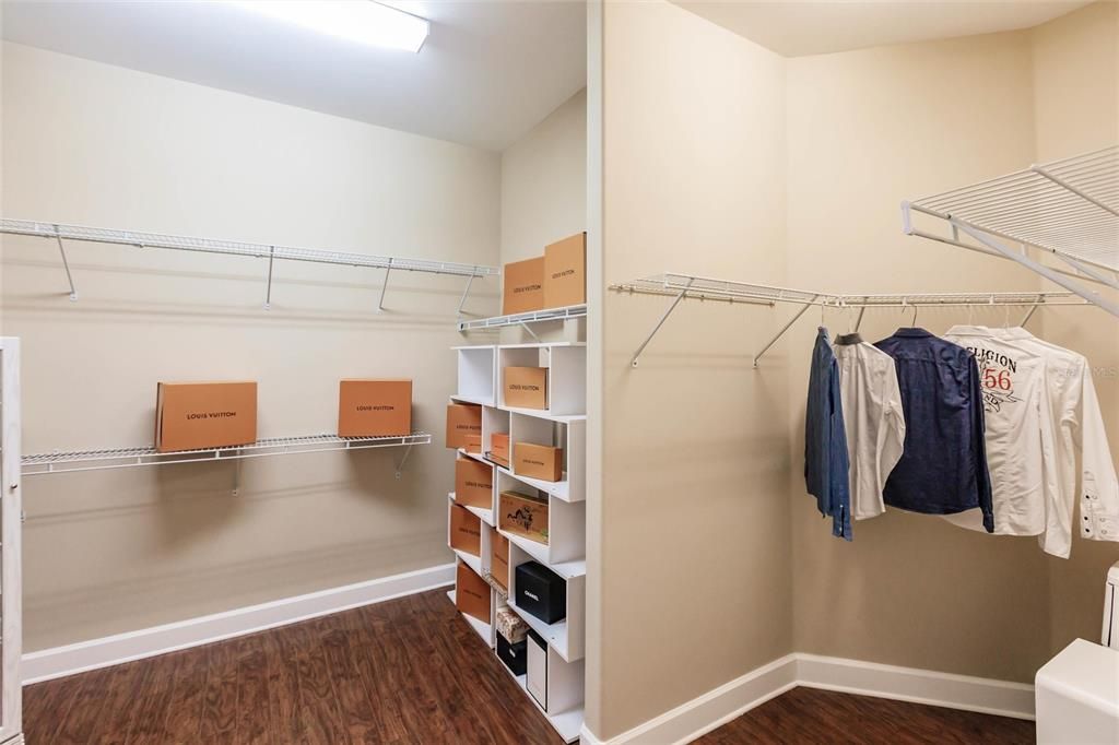 Large master walk-in with shelving.