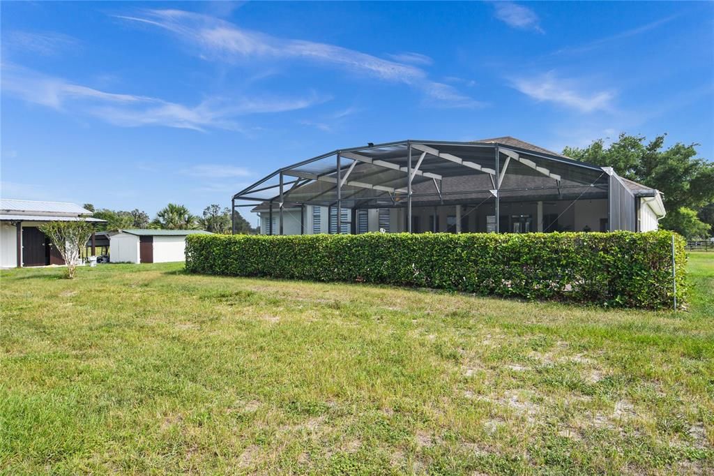 Over 5 HIGH & DRY ACRES, plus OUTBUILDINGS for a variety of needs!