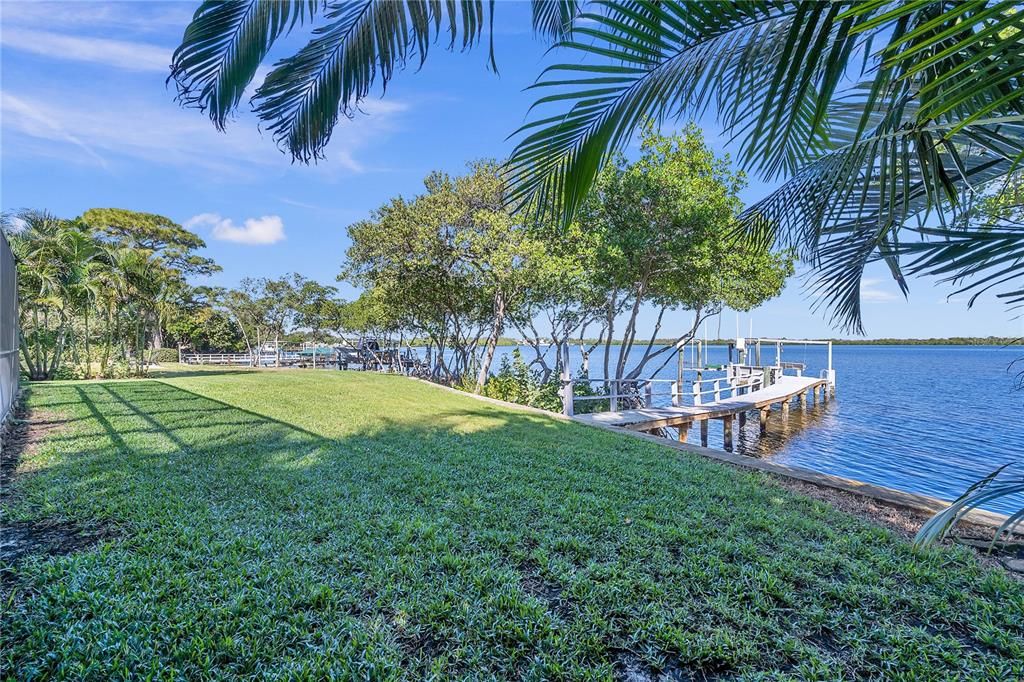 Back yard and dock with 80ft of waterfront on the open bay