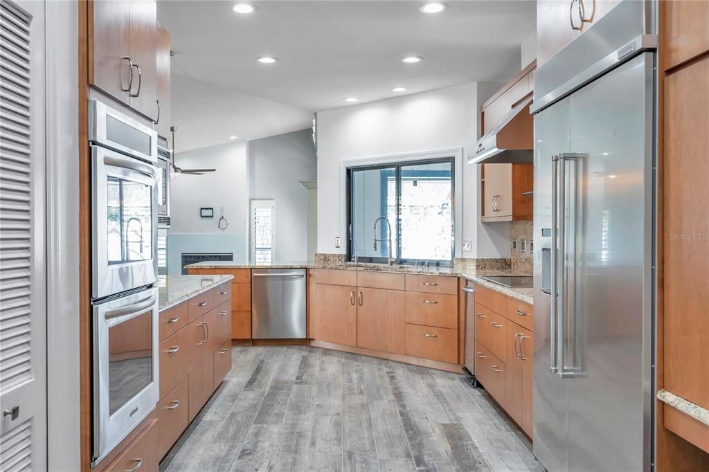European styled kitchen with built in stainless steel appliances