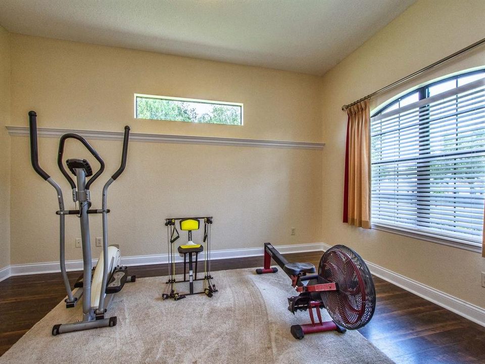 Apartment bedroom being used as workout room