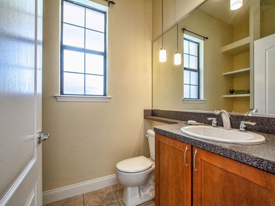 Apartment bath with step in shower