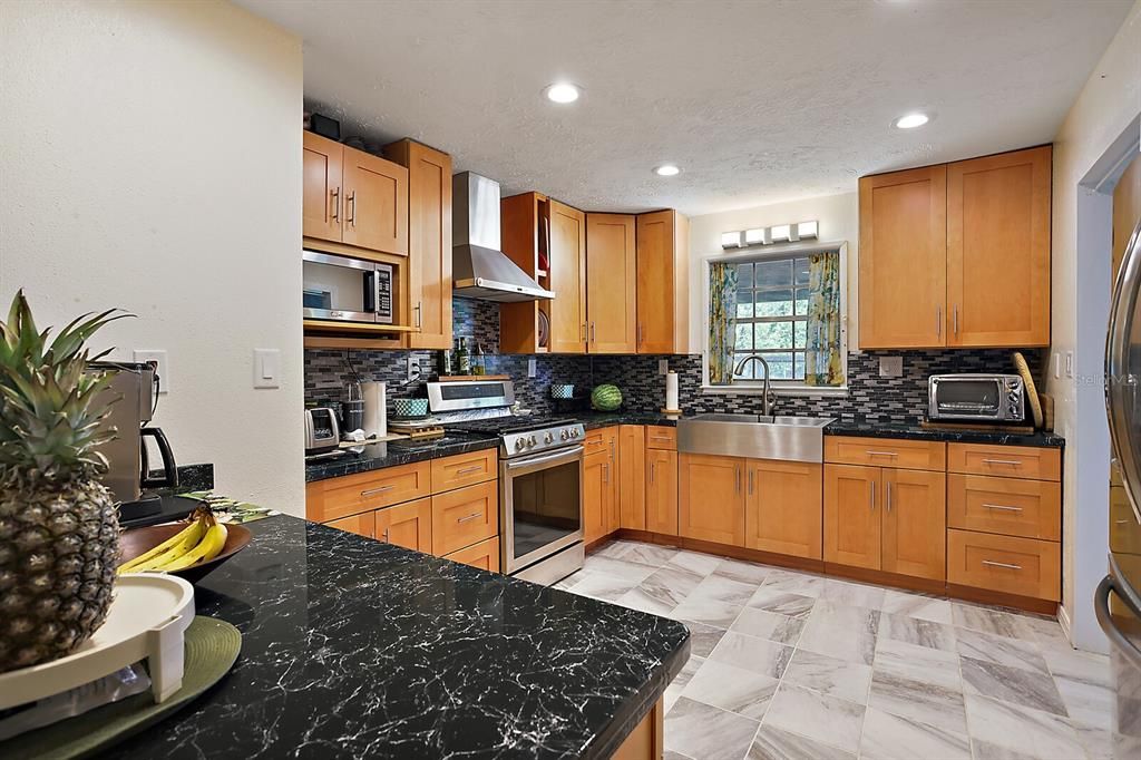 Open Floor Kitchen with Stainless Steel appliances